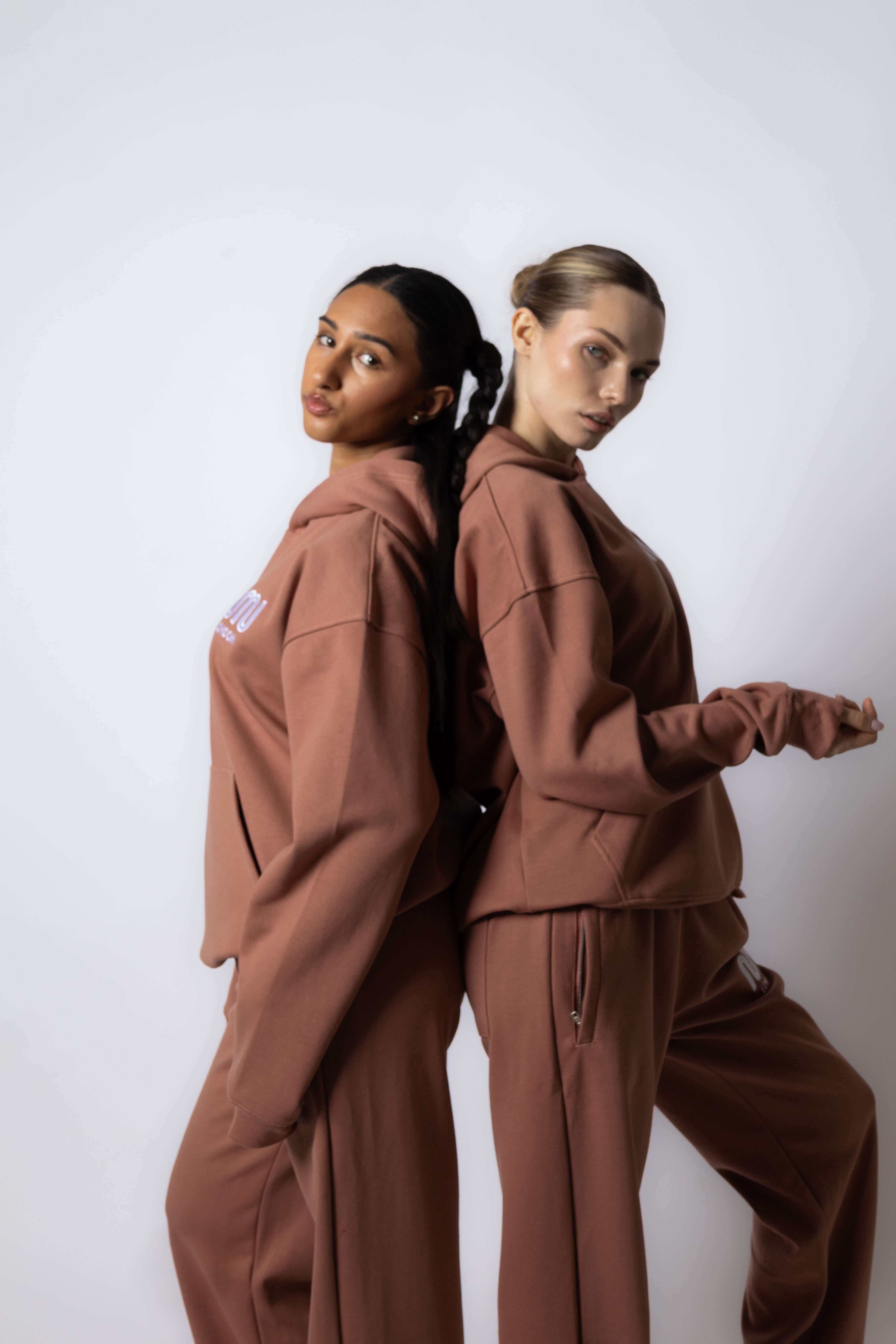 HEAVEN Relaxed Fit Hoodie - Premium Heavyweight Loungewear HEAVEN Hoodie front view HEAVEN Hoodie back view HEAVEN Wide Leg Joggers - Heavyweight Loungewear HEAVEN Joggers front view HEAVEN Wide Leg Joggers lifestyle shot Pulse Sports Bra with white logo