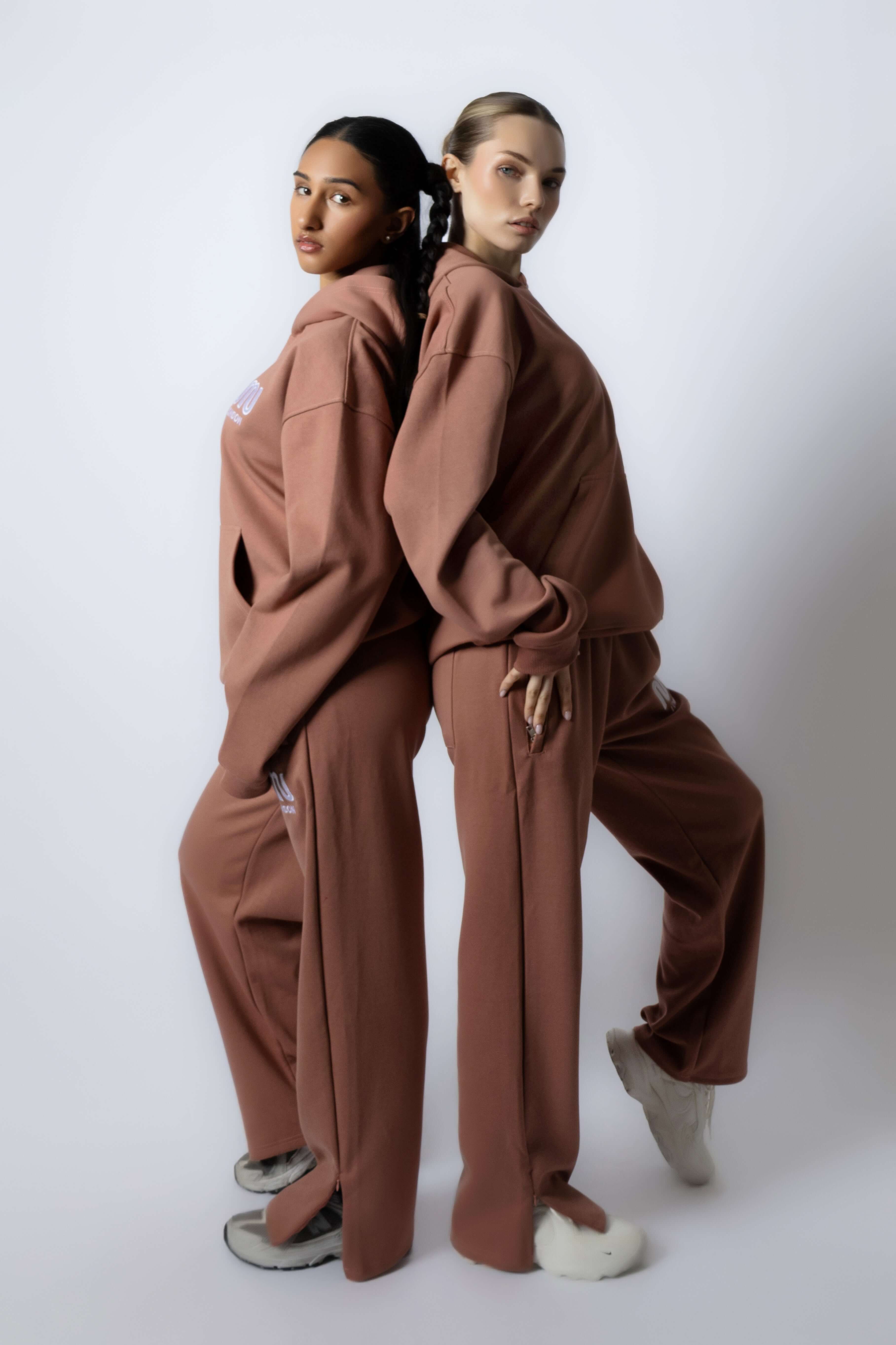 HEAVEN Relaxed Fit Hoodie - Premium Heavyweight Loungewear HEAVEN Hoodie front view HEAVEN Hoodie back view HEAVEN Wide Leg Joggers - Heavyweight Loungewear HEAVEN Joggers front view HEAVEN Wide Leg Joggers lifestyle shot Pulse Sports Bra with white logo