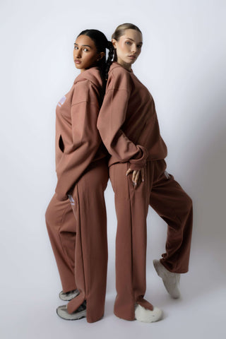 HEAVEN Relaxed Fit Hoodie - Premium Heavyweight Loungewear HEAVEN Hoodie front view HEAVEN Hoodie back view HEAVEN Wide Leg Joggers - Heavyweight Loungewear HEAVEN Joggers front view HEAVEN Wide Leg Joggers lifestyle shot Pulse Sports Bra with white logo
