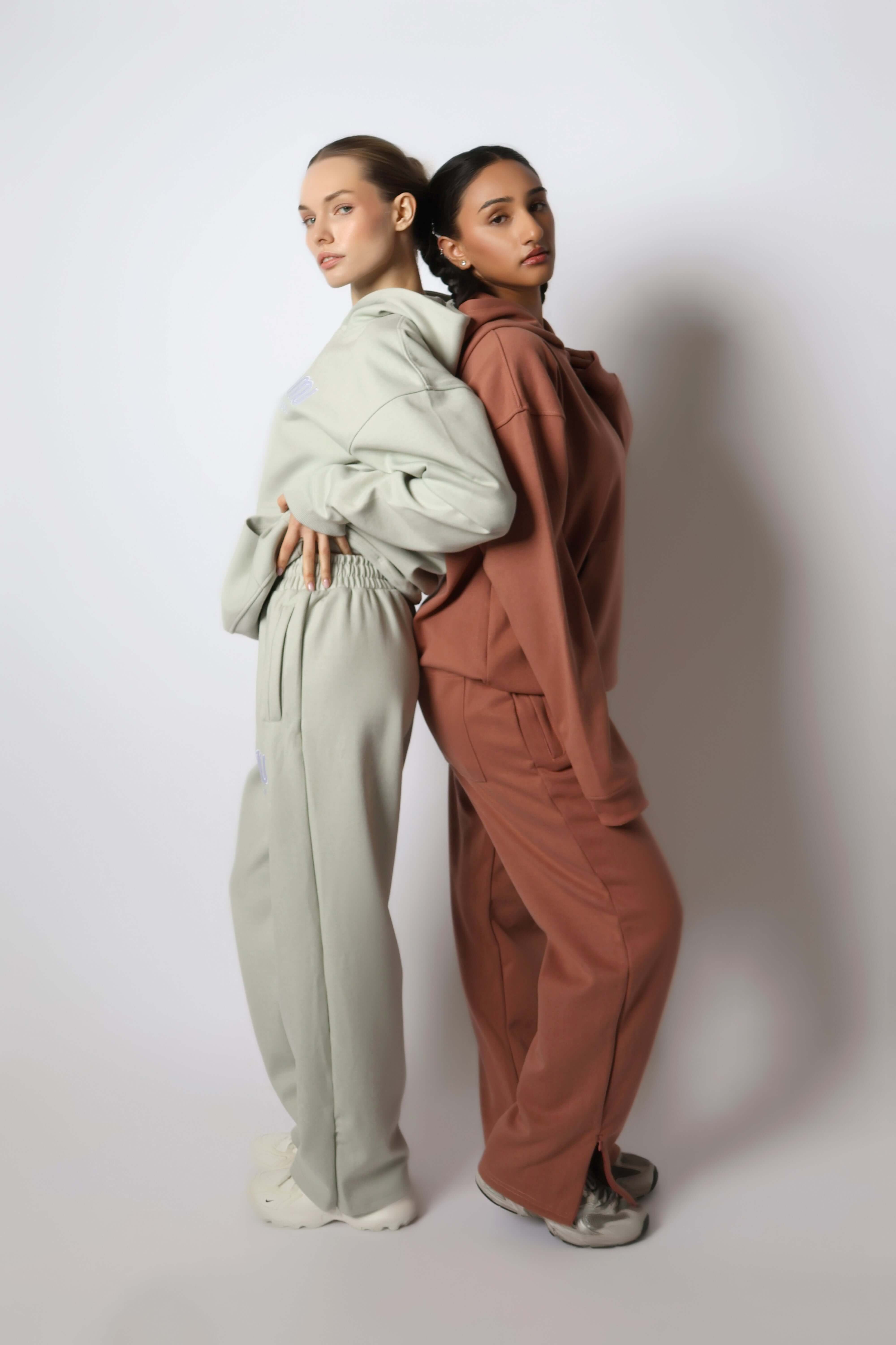 HEAVEN Relaxed Fit Hoodie - Premium Heavyweight Loungewear HEAVEN Hoodie front view HEAVEN Hoodie back view HEAVEN Wide Leg Joggers - Heavyweight Loungewear HEAVEN Joggers front view HEAVEN Wide Leg Joggers lifestyle shot Pulse Sports Bra with white logo