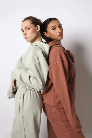 HEAVEN Relaxed Fit Hoodie - Premium Heavyweight Loungewear HEAVEN Hoodie front view HEAVEN Hoodie back view HEAVEN Wide Leg Joggers - Heavyweight Loungewear HEAVEN Joggers front view HEAVEN Wide Leg Joggers lifestyle shot Pulse Sports Bra with white logo