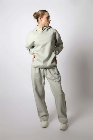 HEAVEN Relaxed Fit Hoodie - Premium Heavyweight Loungewear HEAVEN Hoodie front view HEAVEN Hoodie back view HEAVEN Wide Leg Joggers - Heavyweight Loungewear HEAVEN Joggers front view HEAVEN Wide Leg Joggers lifestyle shot Pulse Sports Bra with white logo