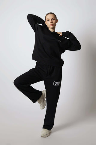 HEAVEN Relaxed Fit Hoodie - Premium Heavyweight Loungewear HEAVEN Hoodie front view HEAVEN Hoodie back view HEAVEN Wide Leg Joggers - Heavyweight Loungewear HEAVEN Joggers front view HEAVEN Wide Leg Joggers lifestyle shot Pulse Sports Bra with white logo