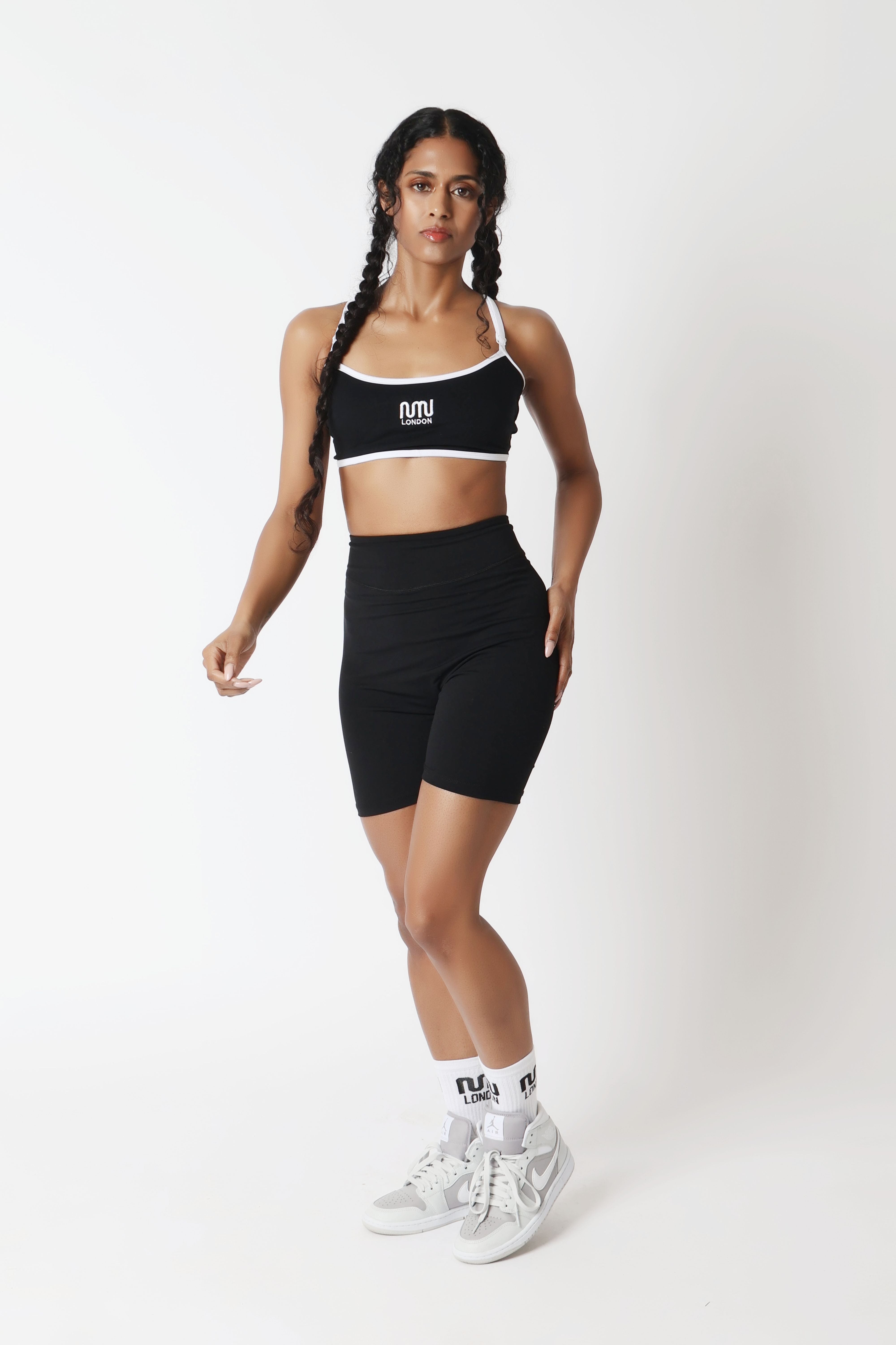Women wearing MN London black gym shorts gym workout