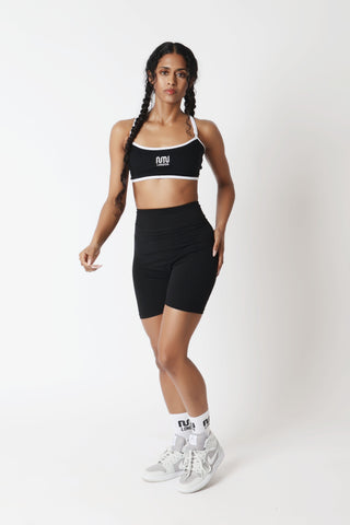 Women wearing MN London black gym shorts gym workout