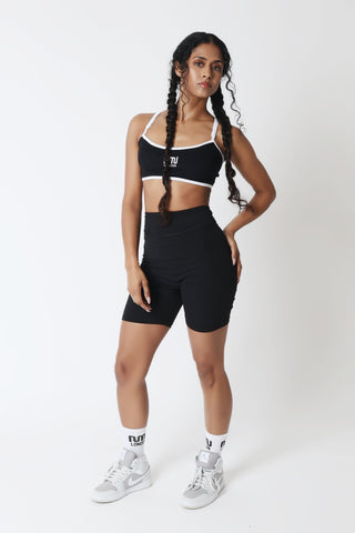 Women's black gym shorts dynamic movement MN London UK