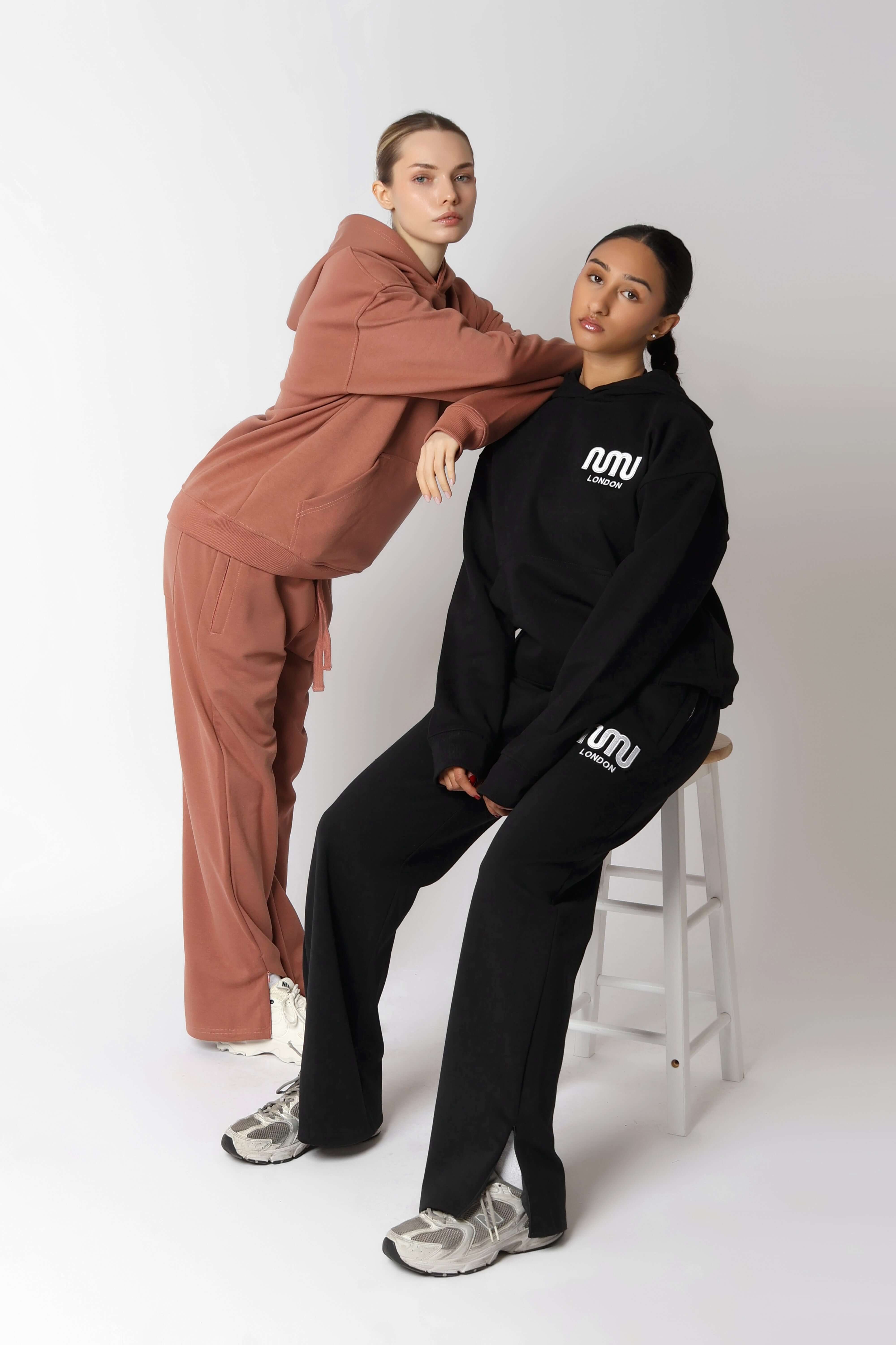 HEAVEN Relaxed Fit Hoodie - Premium Heavyweight Loungewear HEAVEN Hoodie front view HEAVEN Hoodie back view HEAVEN Wide Leg Joggers - Heavyweight Loungewear HEAVEN Joggers front view HEAVEN Wide Leg Joggers lifestyle shot Pulse Sports Bra with white logo