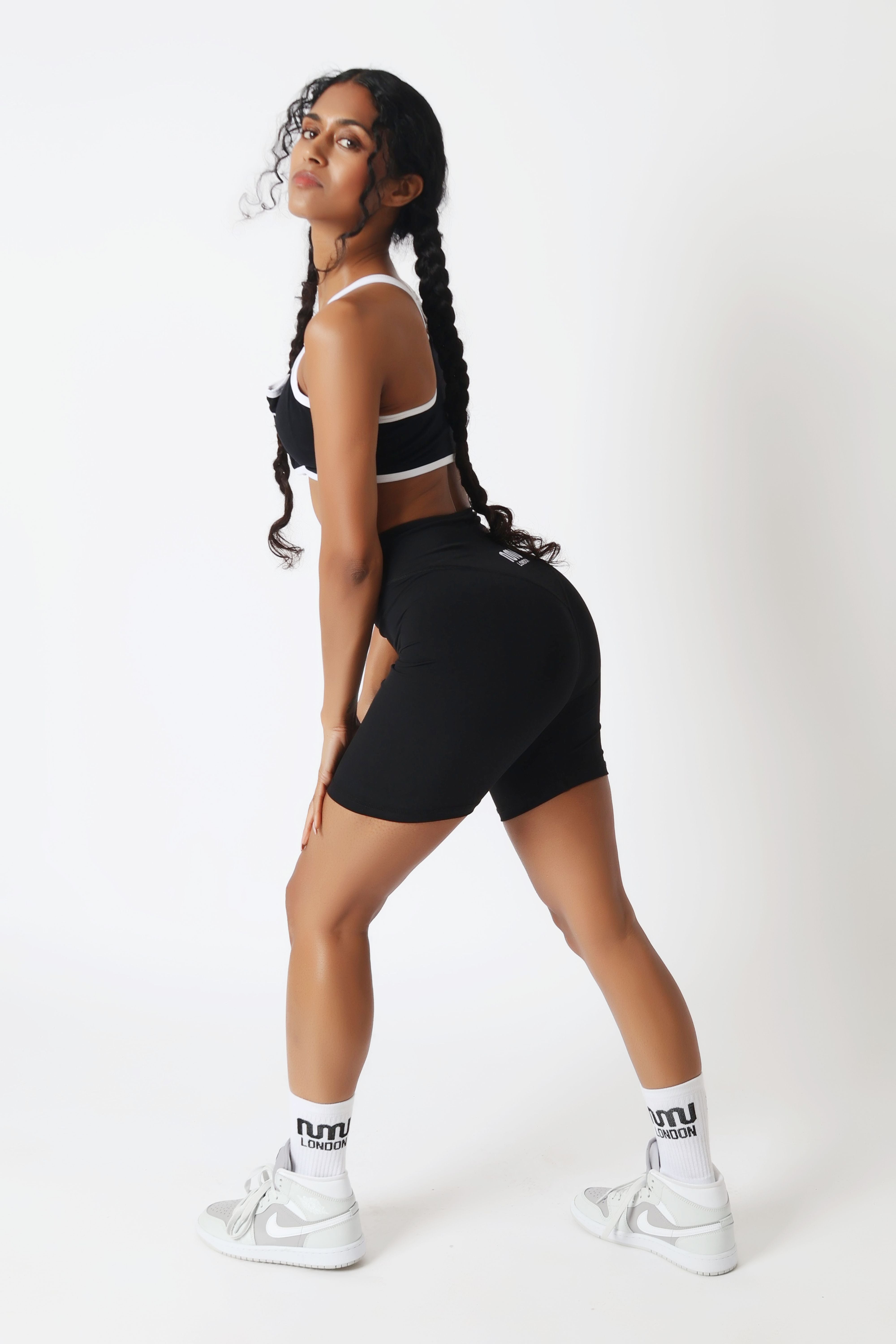 Black gym shorts flat lay SoftMotion MN London women