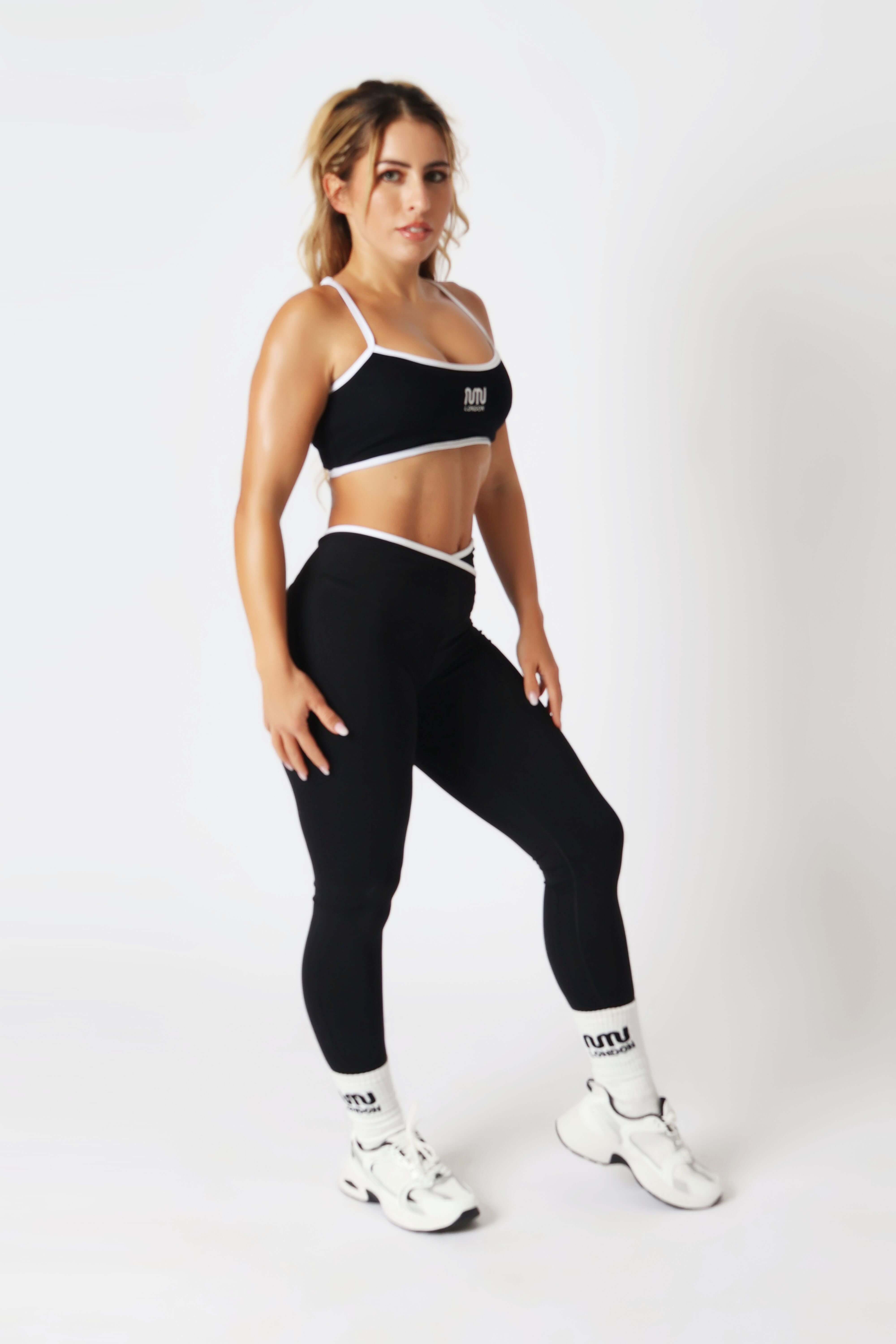 HEAVEN Relaxed Fit Hoodie - Premium Heavyweight Loungewear HEAVEN Hoodie front view HEAVEN Hoodie back view HEAVEN Wide Leg Joggers - Heavyweight Loungewear HEAVEN Joggers front view HEAVEN Wide Leg Joggers lifestyle shot Pulse Sports Bra with white logo